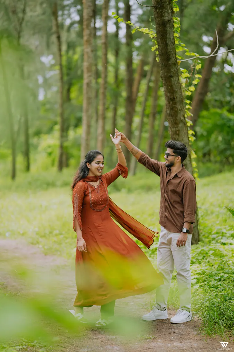 Jishnu twirling Alka on a forest path